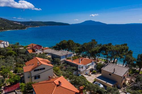 an aerial view of a town and the ocean at Apartman Marina in Martinšćica