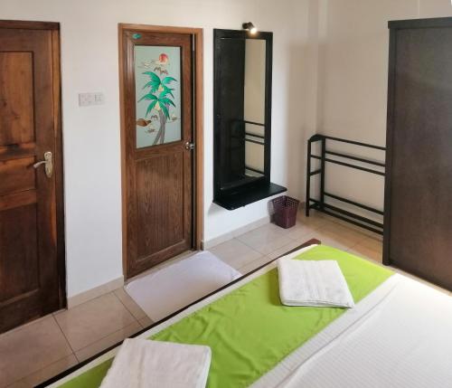 Cama o camas de una habitación en Villa One64 Beach Front - Apartments