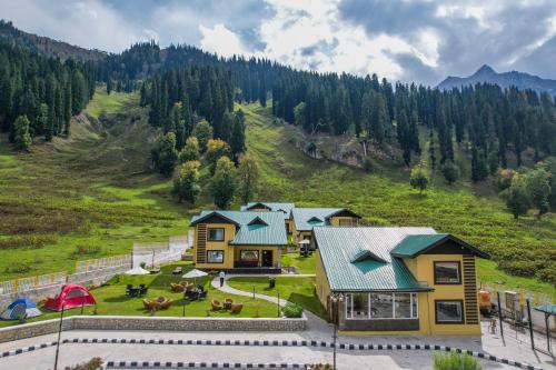 an aerial view of a house in the mountains at Arco Hotels & Resorts sonamarg in Sonāmarg