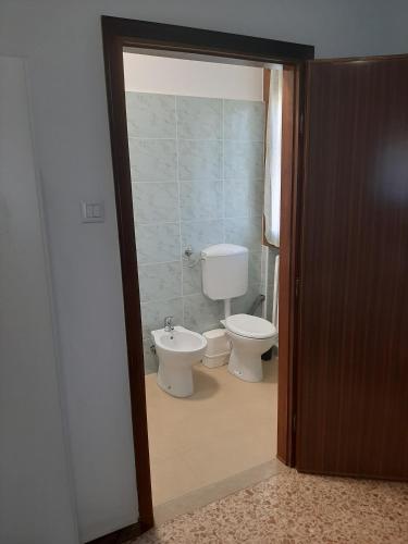 a bathroom with a toilet and a bidet at B&B Casa Piva in Serravalle