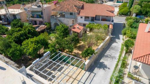 an aerial view of a house with trees and buildings at Mystras Residence Upper Floor in Mystras