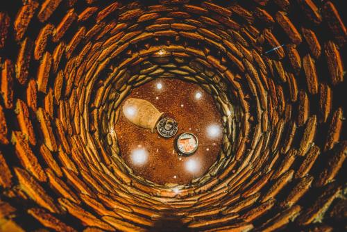 a view of a tunnel with a clock in it at Boutique Hotel Kviria in Tʼelavi