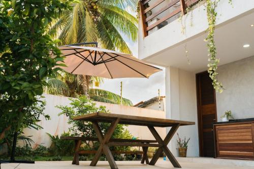 En balkon eller terrasse på Casa de Praia Areia Vermelha