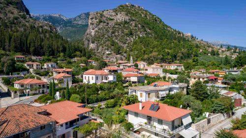 a small town in the mountains with houses at Mystras Residence Ground Floor in Mystras