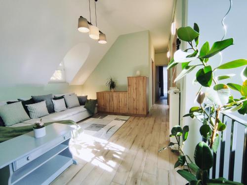 Ένα ή περισσότερα κρεβάτια σε δωμάτιο στο Szömörce Vendégház