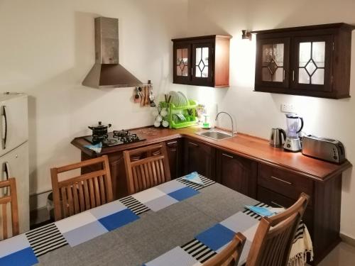 Una cocina o zona de cocina en Villa One64 Beach Front - Apartments