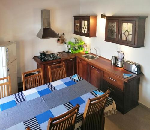 Una cocina o zona de cocina en Villa One64 Beach Front - Apartments