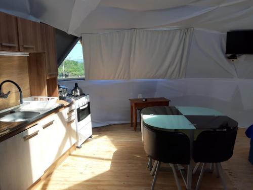 Kuchyň nebo kuchyňský kout v ubytování Casa Domo Se Reserva con SEÑA UTE APARTE