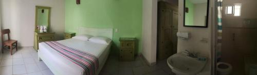 Katil atau katil-katil dalam bilik di Hotel Quinta Mar y Selva
