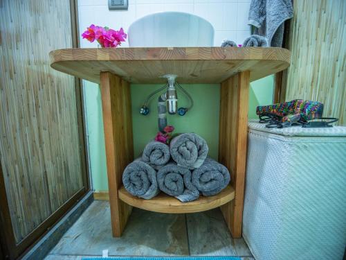 a shelf with donuts on it in a room at Uka O Te Ra´a Cabaña full equipada. in Hanga Roa