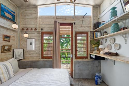 Una cama o camas en una habitación de Casa Botanica Hotel