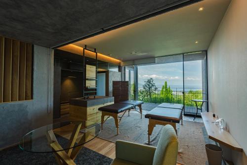 a bathroom with a glass table and a sink at SEKIYA RESORT Galleria Midobaru in Beppu