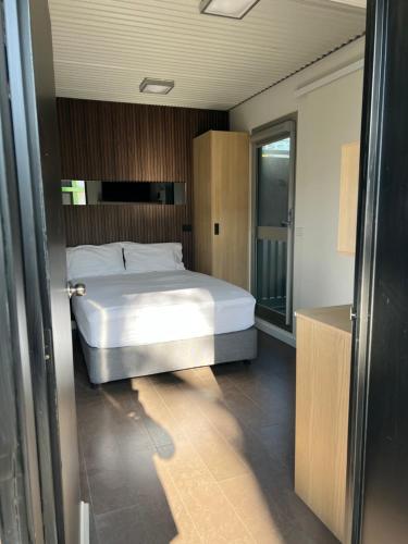 a bedroom with a large bed in a room at The Sea Pavilions in Cowes