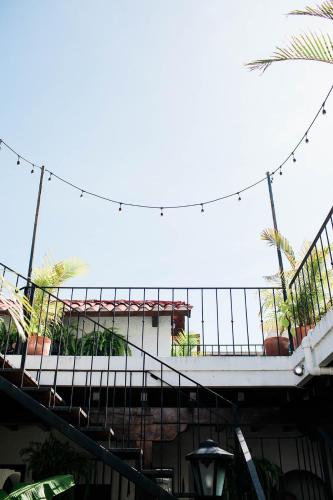 a building with a staircase with lights on it at Cacao Boutique Hotel in Antigua Guatemala