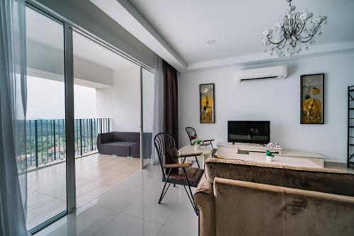 a living room with a view of a living room at Sky Bungalow NIlai by James NEARBY KLIA, KLIA 2, CYBERJAYA, PUTRAJAYA in Nilai