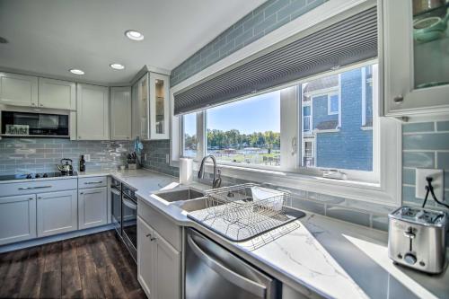 a kitchen with a sink and a window at Home on Fox River Modern Decor Style! in McHenry