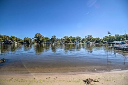 a large body of water with a dock at Home on Fox River Modern Decor Style! in McHenry
