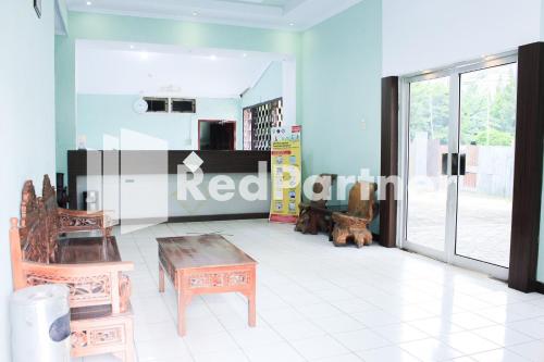 Køkken eller tekøkken på Hotel Mexicanna Syariah Mitra RedDoorz