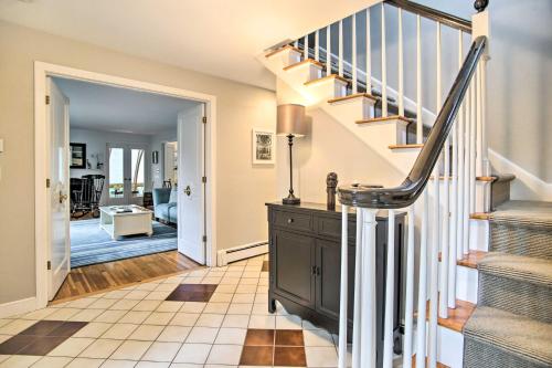 a staircase in a home with aoyer at Falmouth Retreat with Deck and Grill, Walk to Beaches! in Falmouth