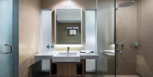 Vonios kambarys apgyvendinimo įstaigoje Hotel Santika Gunungkidul