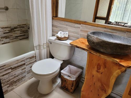 Salle de bains dans l'établissement Hotel Manavai