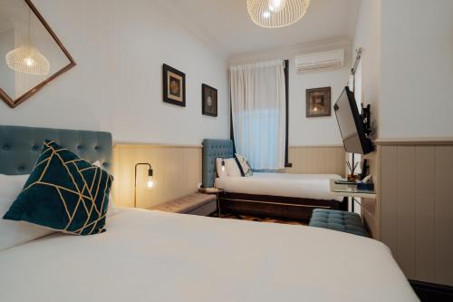 Postel nebo postele na pokoji v ubytování Cremorne Point Manor