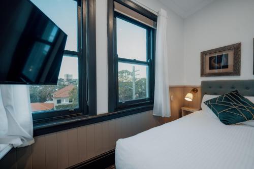 Postel nebo postele na pokoji v ubytování Cremorne Point Manor