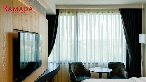 Posezení v ubytování Ramada by Wyndham Slatina Parc