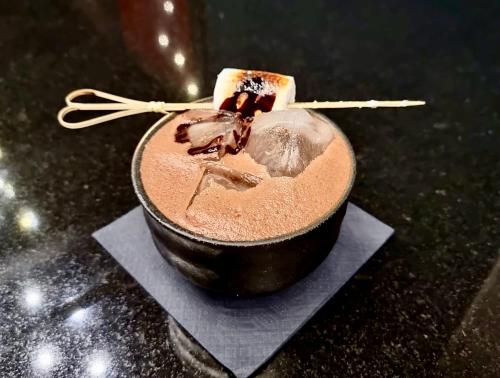 a chocolate dessert in a bowl on a counter at Hotel Credé in Kassel