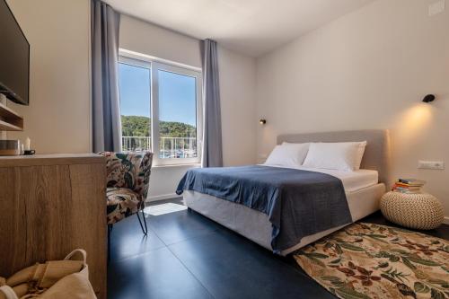 Posteľ alebo postele v izbe v ubytovaní Luxury Seaview Studio Apartment - Luna