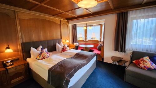 Säng eller sängar i ett rum på Hotel BLIZZ