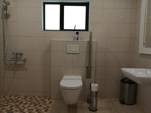 Koupelna v ubytování Capbon Guesthouse