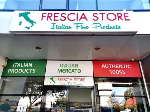 a store sign for a fusion fire products at Airport Residence in Otopeni