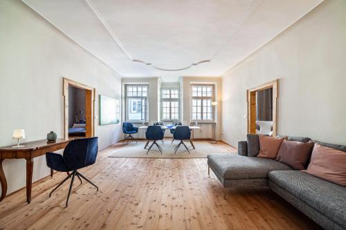 a living room with a couch and a table at Lauben 75 in Merano