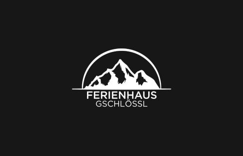 a logo for a ski resort with a mountain at Gschlössl, Ferienhaus in Rauris