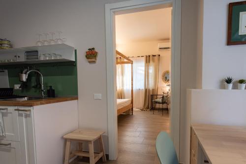 Kuchyň nebo kuchyňský kout v ubytování Tenuta Tre Gemme a mare - Suite Salvia