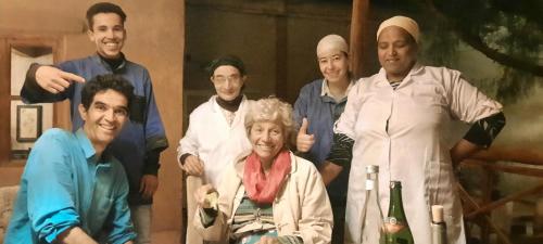 a group of people posing for a picture at Maison d'Hôtes Irocha in Tisselday