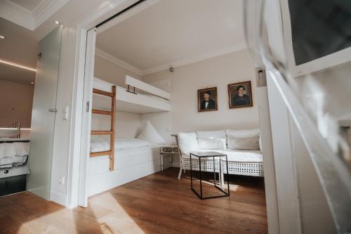 Η κουζίνα ή μικρή κουζίνα στο Boutique Hotel am Rathaus - Reblaus
