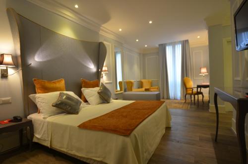 מיטה או מיטות בחדר ב-Hotel Campo Marzio