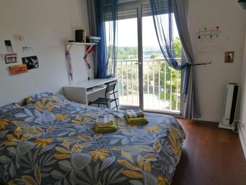 Postel nebo postele na pokoji v ubytování Bel appartement de standing idéalement situé