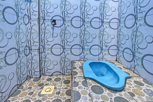 Et badeværelse på SPOT ON 91811 Rumah Inap Bunda Nurhayati