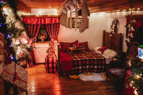 Postel nebo postele na pokoji v ubytování Skansen Bicz Resort