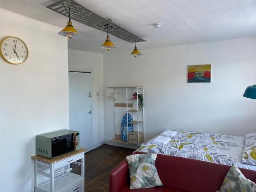 En eller flere senger på et rom på Accommodation HUB Studio 2