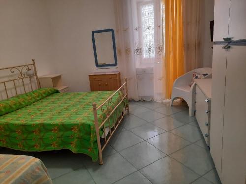 Katil atau katil-katil dalam bilik di Casa Vacanza Villa Lesto