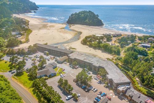 an aerial view of a building and a beach at Neskowin Nirvana in Neskowin