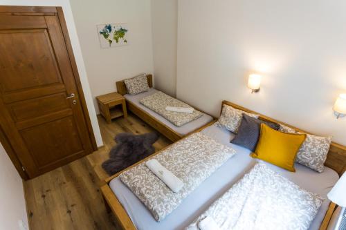 Postel nebo postele na pokoji v ubytování Vila Jensen