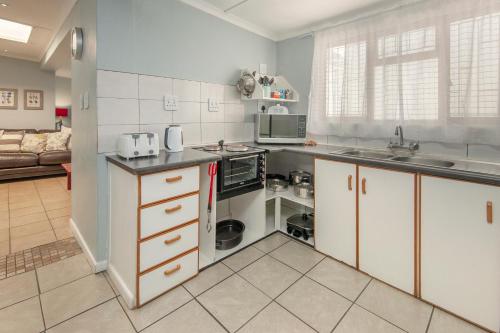 Küche/Küchenzeile in der Unterkunft Albatross Accommodation