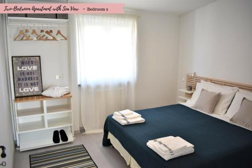 Katil atau katil-katil dalam bilik di Front Beach Apartments - Attic
