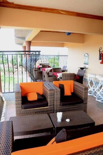 Χώρος καθιστικού στο Mujjo Hotel Kajjansi