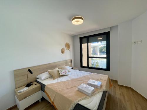 Ένα ή περισσότερα κρεβάτια σε δωμάτιο στο Allon Bay